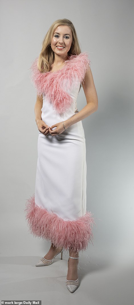 A Cilla 1960s/70s white, sleeveless dress trimmed with pink ostrich feathers. Price at auction: £200-£300