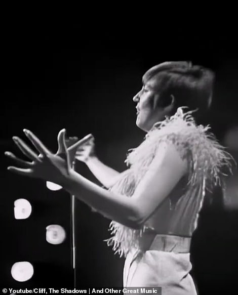 Cilla sings her heart out to 'You've Lost That Loving Feeling' in 1968, wearing a white dress with feather trims
