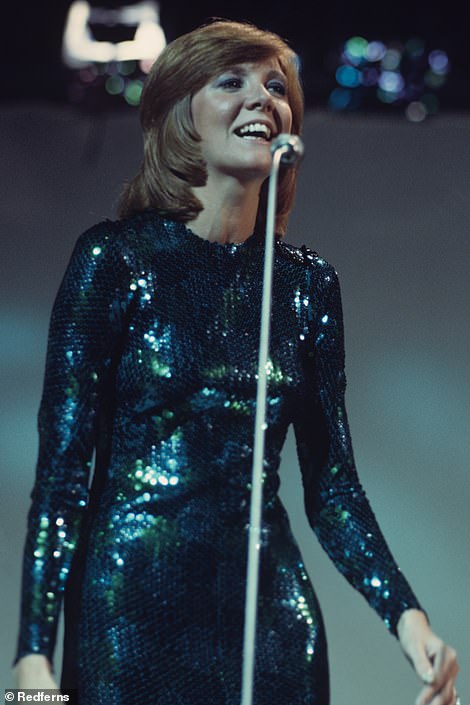 The sleeves of the dress are so tight that there are secret zips hidden in them to make it easier to put on