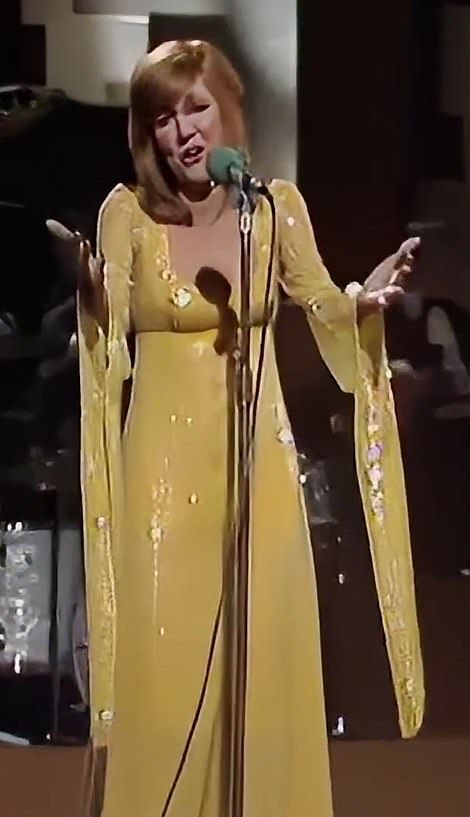 A butter yellow gown worn by the star on the 'Cilla' show in November 1971