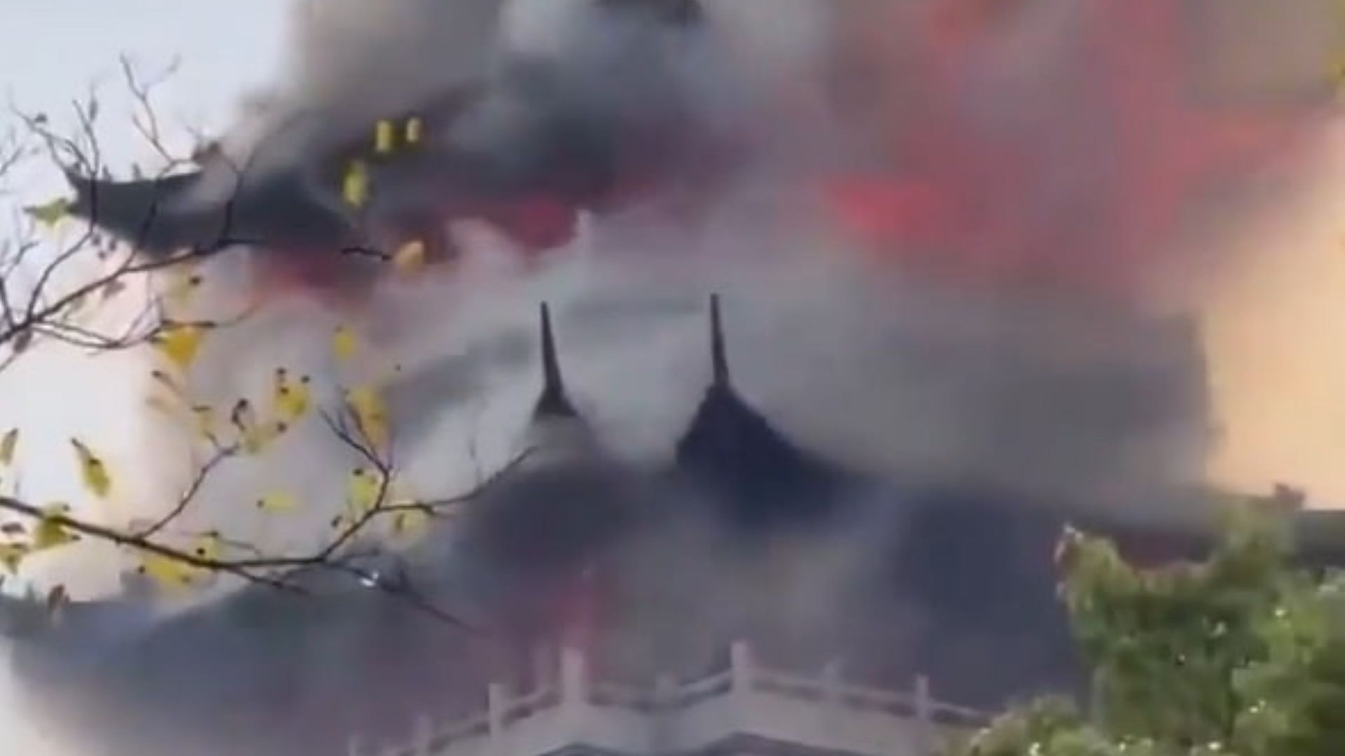 Tragic moment huge blaze engulfs temple after 'irresponsible' tourist is blamed for wrongly using a candle
