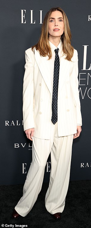 Mandy Moore, 41, rocked a more androgynous look, opting for an oversized white suit with a polka dot tie