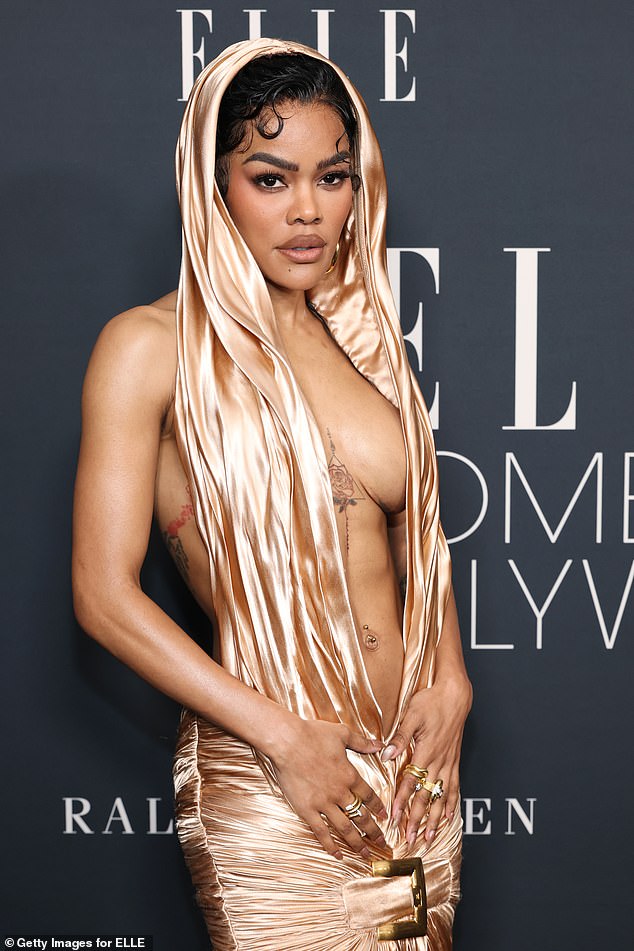 The revealing dress highlighted her ample cleavage