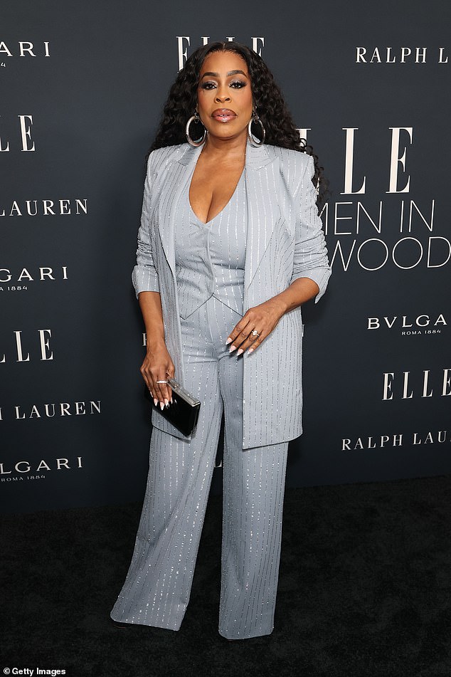 Niecy Nash-Betts, 55, cut a stylish figure in a pale blue striped suit