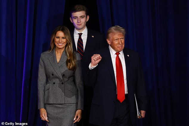 Barron is seen here alongside his mother Melania and father Donald during an election night event last November