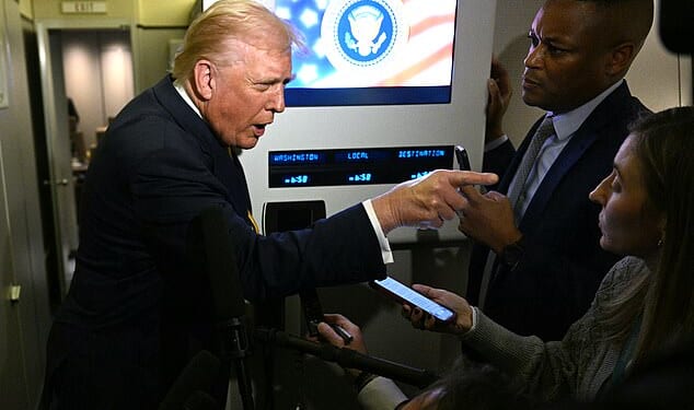 Donald Trump snaps at a journalist after being asked about the Epstein files on Air Force One