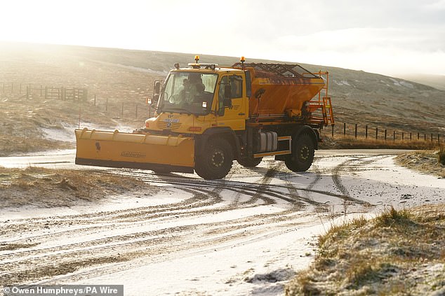A snow plough at Nenthead in Cumbria this morning as Met Office warnings come into force
