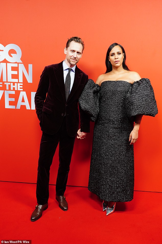 Tom Hiddleston and Zawe Ashton put on a loved-up display as they posed for a photo holding hands