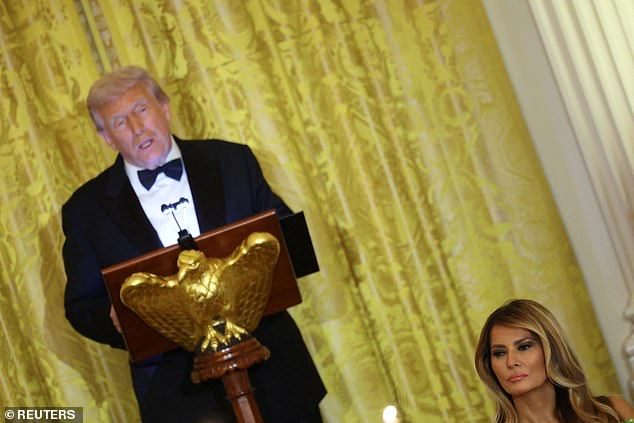 President Donald Trump (left) delivers a toast in honor of MBS as First Lady Melania Trump (right) looks on