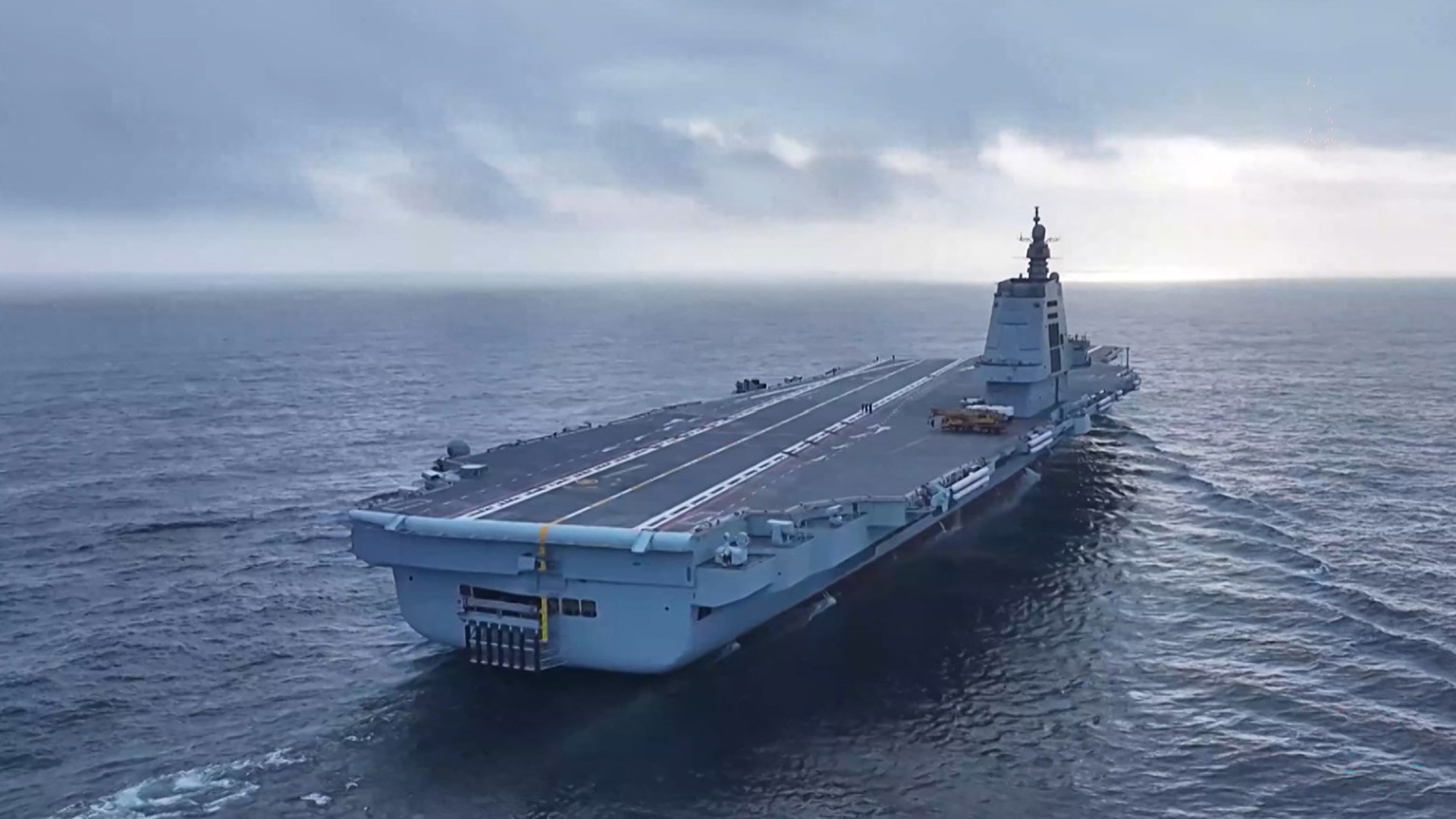 China's brand new aircraft carrier conducts first drills as Japan threatens to back Taiwan if Xi Jinping invades