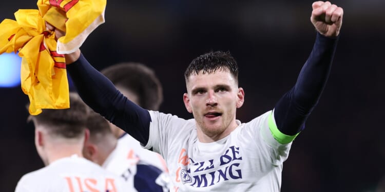 'He'll be smiling somewhere' - Emotional Andy Robertson chokes up over Diogo Jota after guiding Scotland to World Cup