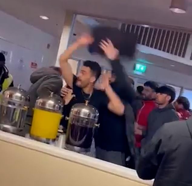 A brawl broke out between some of the migrants in a common area, with men throwing trays at each other