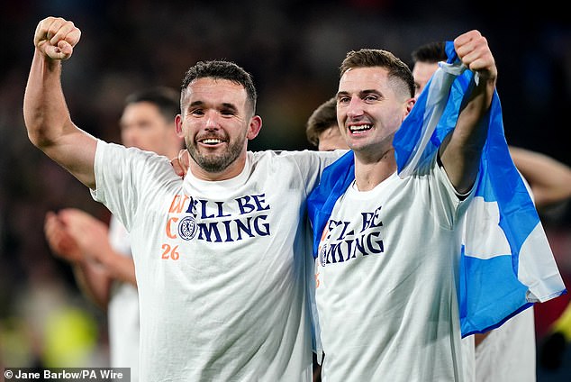 McGinn (left) heaped praise on his former St Mirren team-mate McLean after the final whistle and hailed the squad's achievement