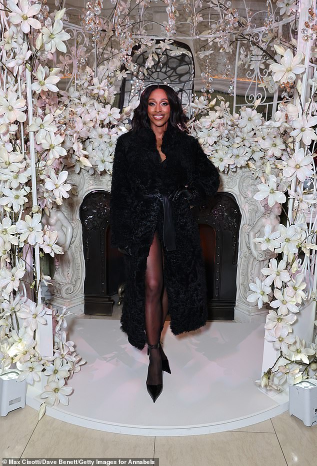 The former X Factor winner styled her sleek locks in a bouncy blow dry and opted for glamorous make-up, boosting her frame with black heels