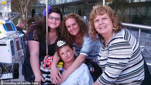 Gent (Center) was in the hospital for over three months and had her left leg amputated due to heart failure and widespread infection