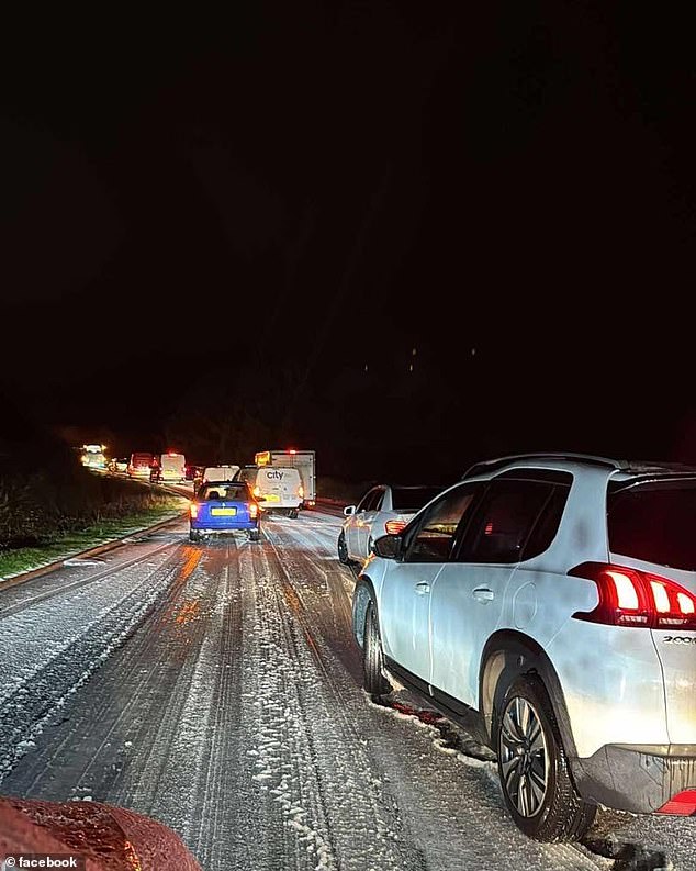 Queues of traffic in the snowy conditions on the A174 Boulby Bank near the North York Moors National Park
