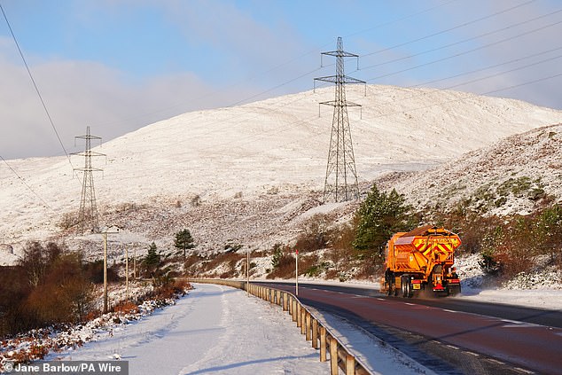 A snowplough on the A9 near Blair Atholl in Scotland today as weather warnings are in force