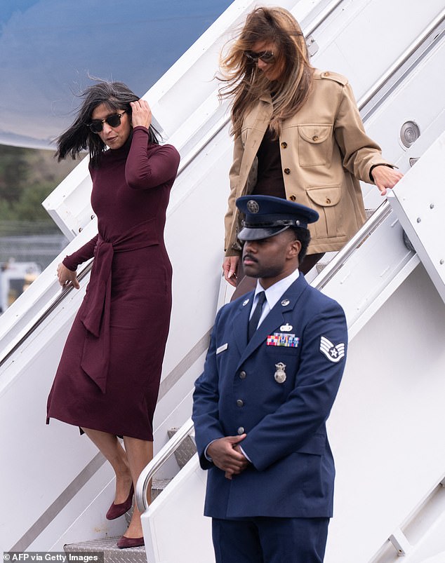 The Second Lady topped off the look with a pair of suede burgundy heels, black Ray-Ban sunglasses, and a pair of statement earrings