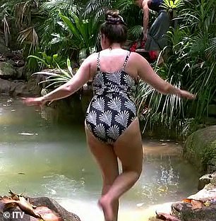 The presenter opted for a floral patterned black swimsuit ahead of her dip