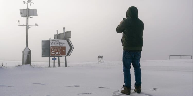 Freezing cold snap grips UK as temps plunge to -11C and Amber warning for snow hits
