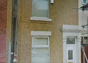 Normal-looking house hid multi-million migrant smuggling EMPIRE run by shadowy TikToker charging £8k per crossing