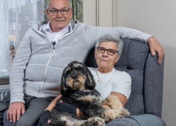 Couple save hundreds on energy bills each month after becoming first in UK to warm their home with heat from computers