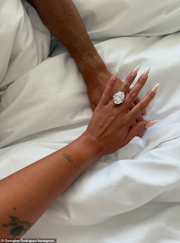 The soccer WAG took to Instagram to show off her enormous diamond ring