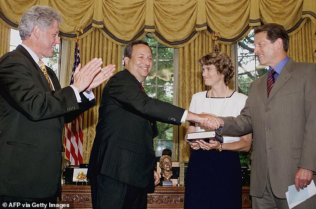 Former Vice President Al Gore is pictured congratulating Summers after he was sworn in as treasury secretary in 1999