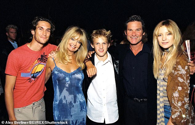 Goldie is a doting mother of three kids and a stepmum to partner Kurt Russell's son (pictured Oliver, Goldie, Wyatt, Kurt and Kate seen in 2000)