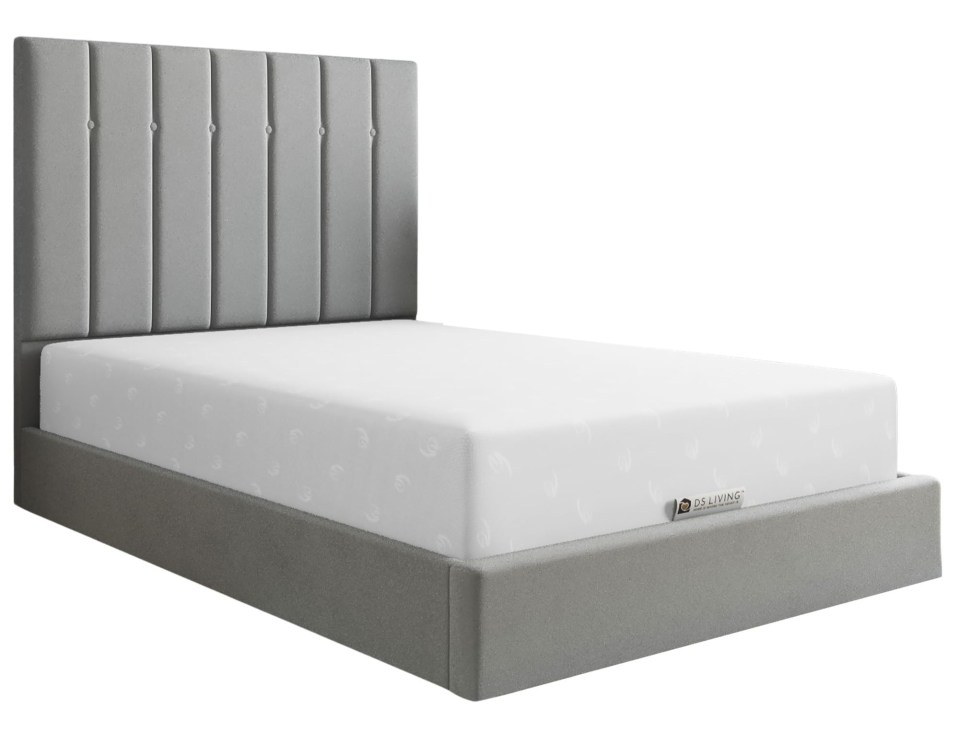 Grey upholstered bed frame with a button-tufted headboard and a white mattress.