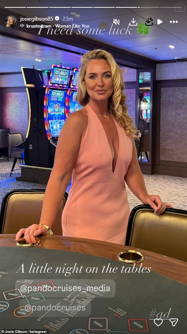 The This Morning star looked sensational as she went braless under the £149 figure hugging halter neck number by House of CB