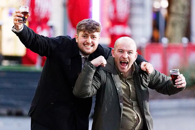 Beaujolais is not for everyone: just ask these two very jubilant men clutching pints
