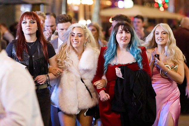 Some Swansea revellers braved temperatures as low as -2C in nothing more than a strappy dress. Others wrapped up more practically for the cold