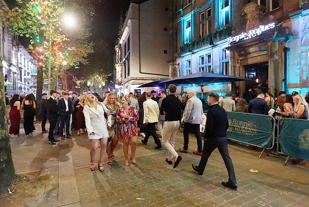 Wind Street in Swansea (pictured) is the Welsh city's nightlife hotspot - with every bar along the street packed out last night