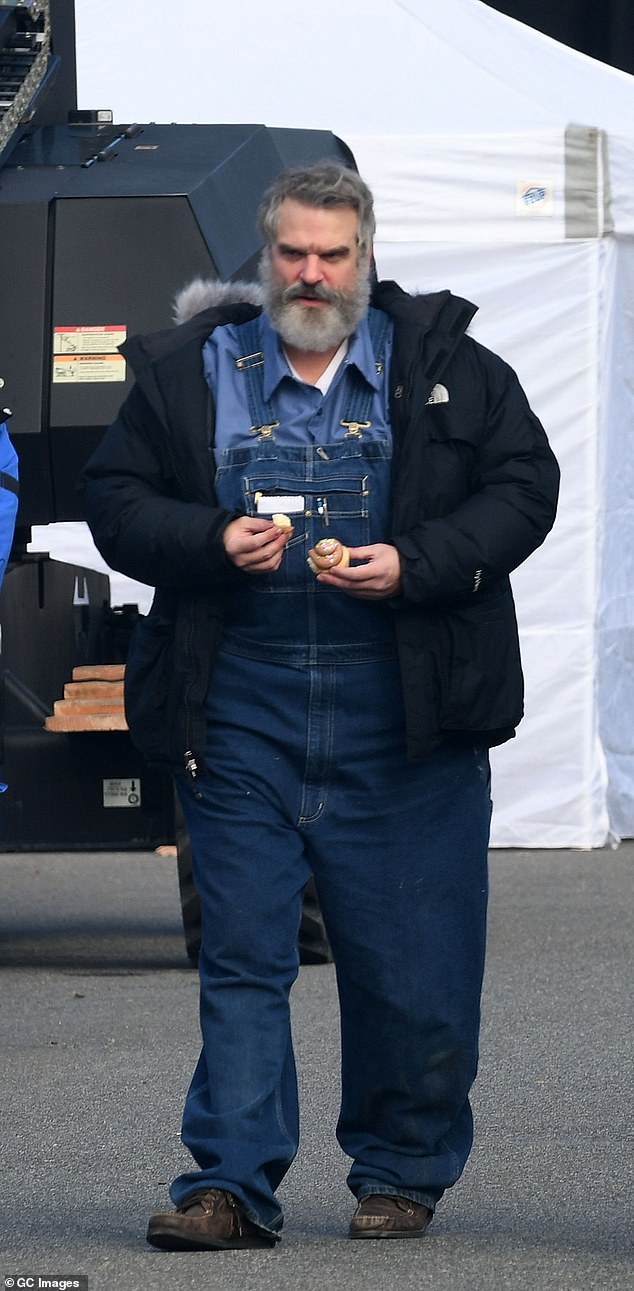 Meanwhile actor David was spotted carrying a coffee on set in New Jersey while filming upcoming crime movie Evil Genius