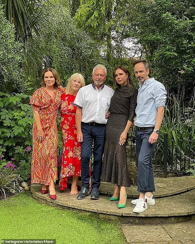 Happy family: Victoria is pictured with her sister Louise, mother Jackie, dad Tony, and younger brother Christian in a rare snap