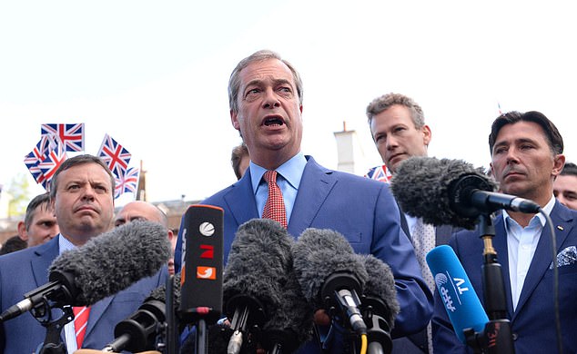Nathan Gill with Reform leader Nigel Farage