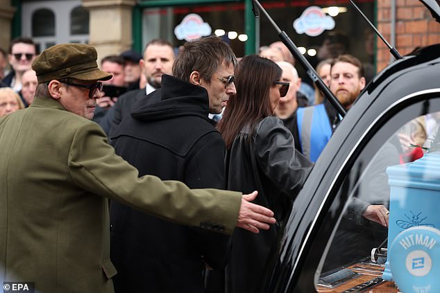 Liam and Mani were close friends and the Oasis star said he was 'devastated' by his passing (pictured together at Ricky Hatton's funeral in September)