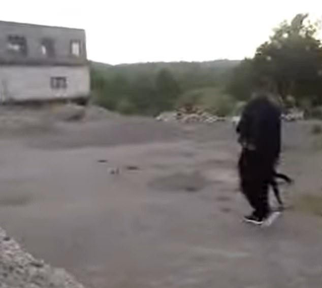 The Eid gathering took place under armed guard: a sentry armed with what appears to be an AK-47 could be seen in one video patrolling the grounds