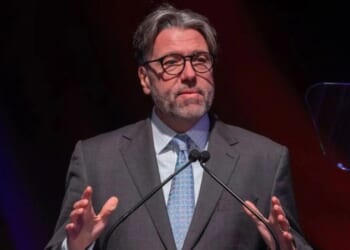 Married company boss and female executive quit after being filmed getting 'frisky' following online meeting