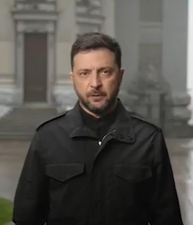 Mr Zelensky addressed the Ukrainian people standing in the rain outside a government building