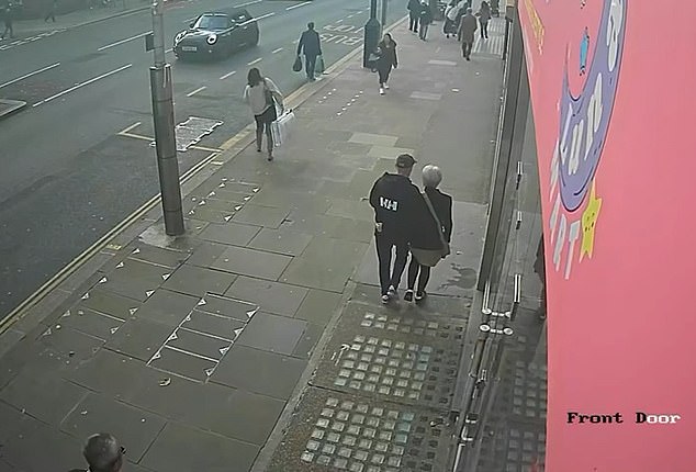 CCTV caught the moment people on High St Kensington watched on in horror at the attack
