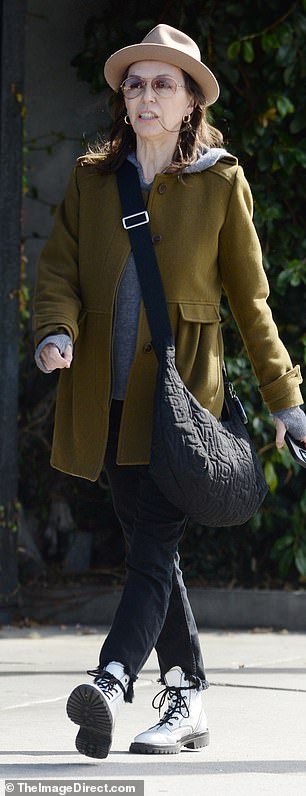 The former How Do I Look? host was a vision of fall fashion in an olive green pea coat and white ankle boots