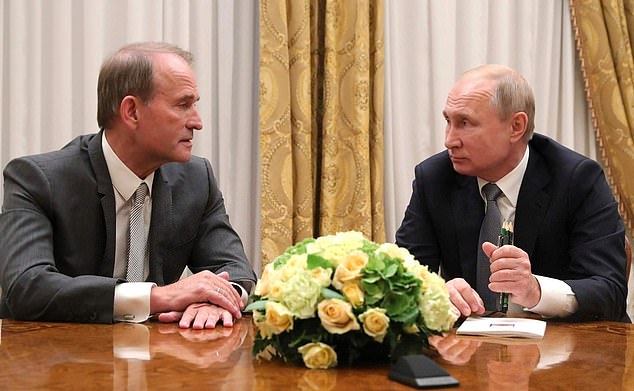 Viktor Medvedchuk with Putin