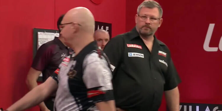 Tense moment James Wade gives Mickey Mansell death stare after frosty handshake with darts rival