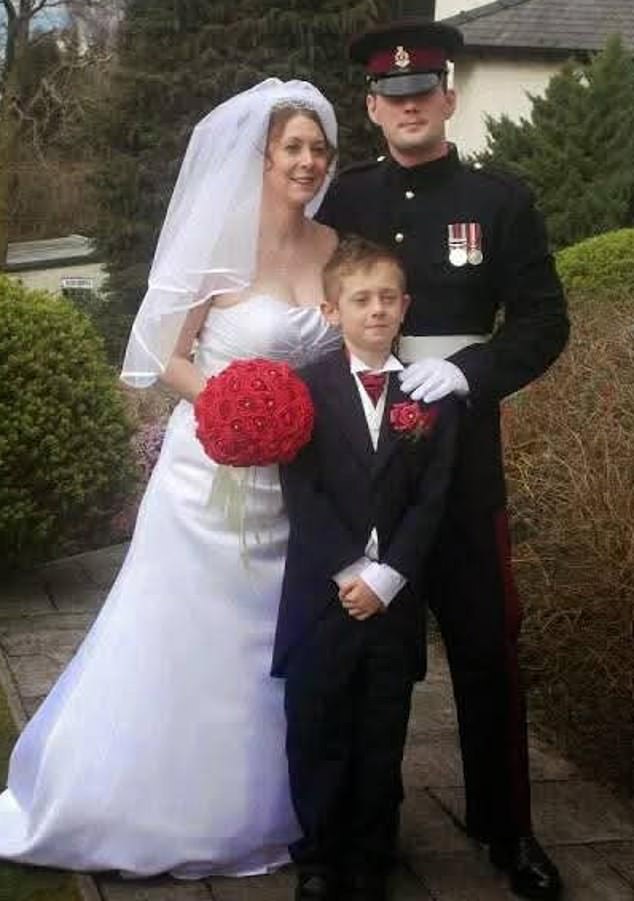 Robert Purkiss with his wife Kelly on their wedding day. He has rejected the allegations and challenged other soldiers¿ accounts that put him in the frame