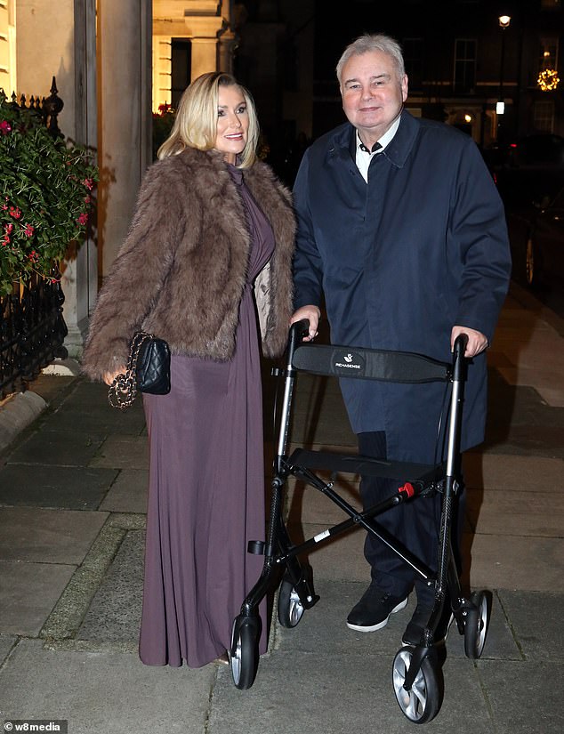 Katie opted for a full glam look for the evening as she wowed in a ruched purple brown dress which she paired with a brown fur look jacket