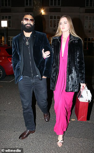 She completed the look with a silver strappy heel