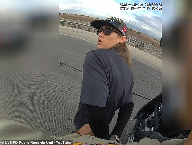 After offering his hands to the officer, Johns was promptly handcuffed and taken into a police vehicle