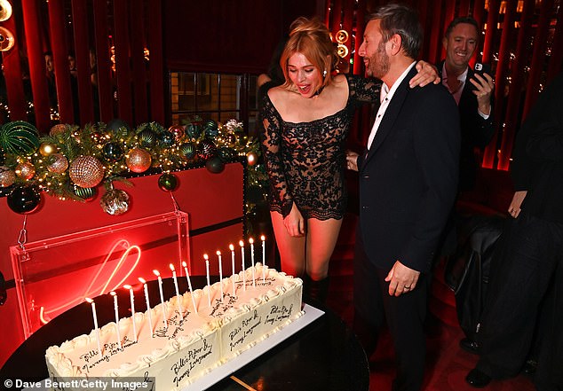 Billie's sisters Harley and Elle Piper were also spotted at the party as they watched their sister blow out her candles